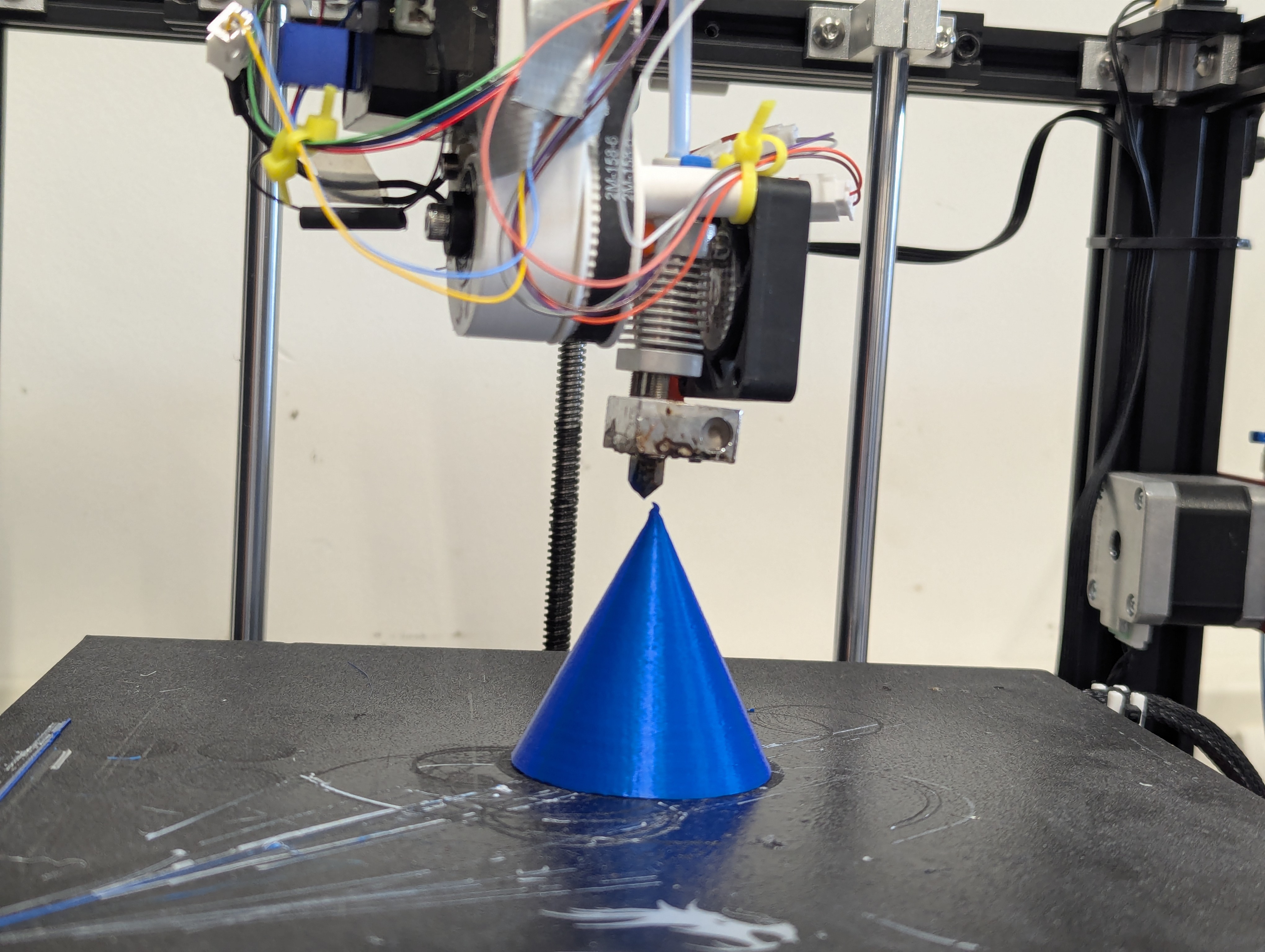 Nozzle positioned at cone tip showing offset error